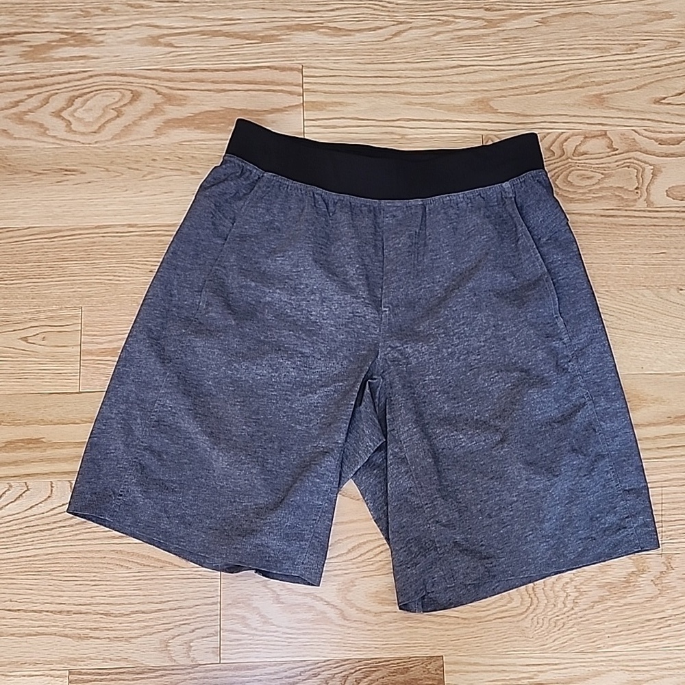 Lululemon athletics men’s large grey with black shorts.